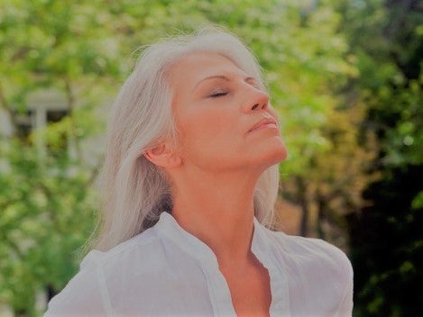 woman-enjoying-fresh-air-outside